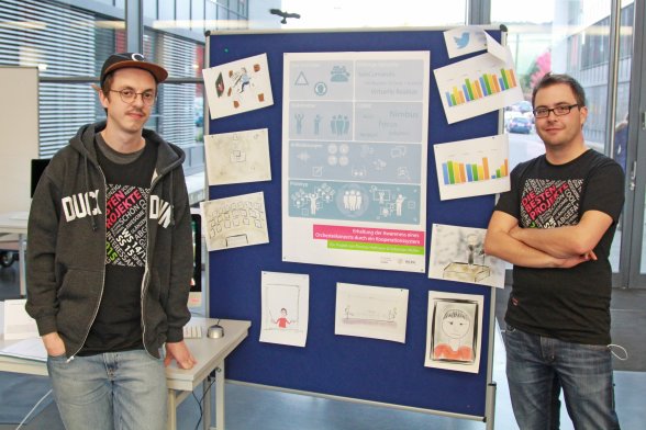 Thomas Hofmann und Sebastian Müller mit ihrem Projekt zur "Awareness eines Orchesterkonzertes durch ein Kooperationssystem"  