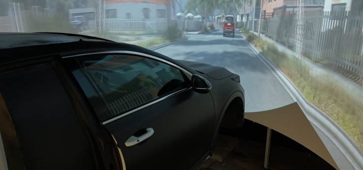 Es ist ein schwarzes durchgeschnittenes Autovorderteil im Fahrsimulator zu sehen (Bild: TH Köln)