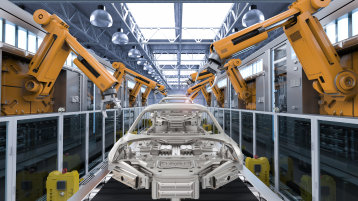 Roboter in Automobilproduktionsstätte (Bild: PhonlamaiPhoto/istock.com)