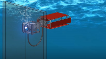 Das Bild zeigt ein Schweißmodul mit dem Unterwasser-Fahrzeug im Hintergrund. (Bild: IWA | TH Köln)