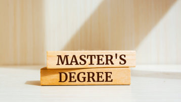 Wooden Blocks with the words Master's Degree (Image: AdobeStock_538861124_Uuganbayar)