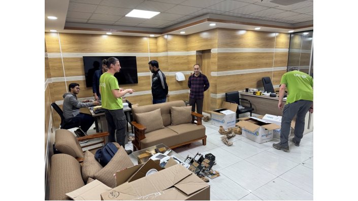 The LIST team at the web-ais office, preparing the monitoring equipment for its installation